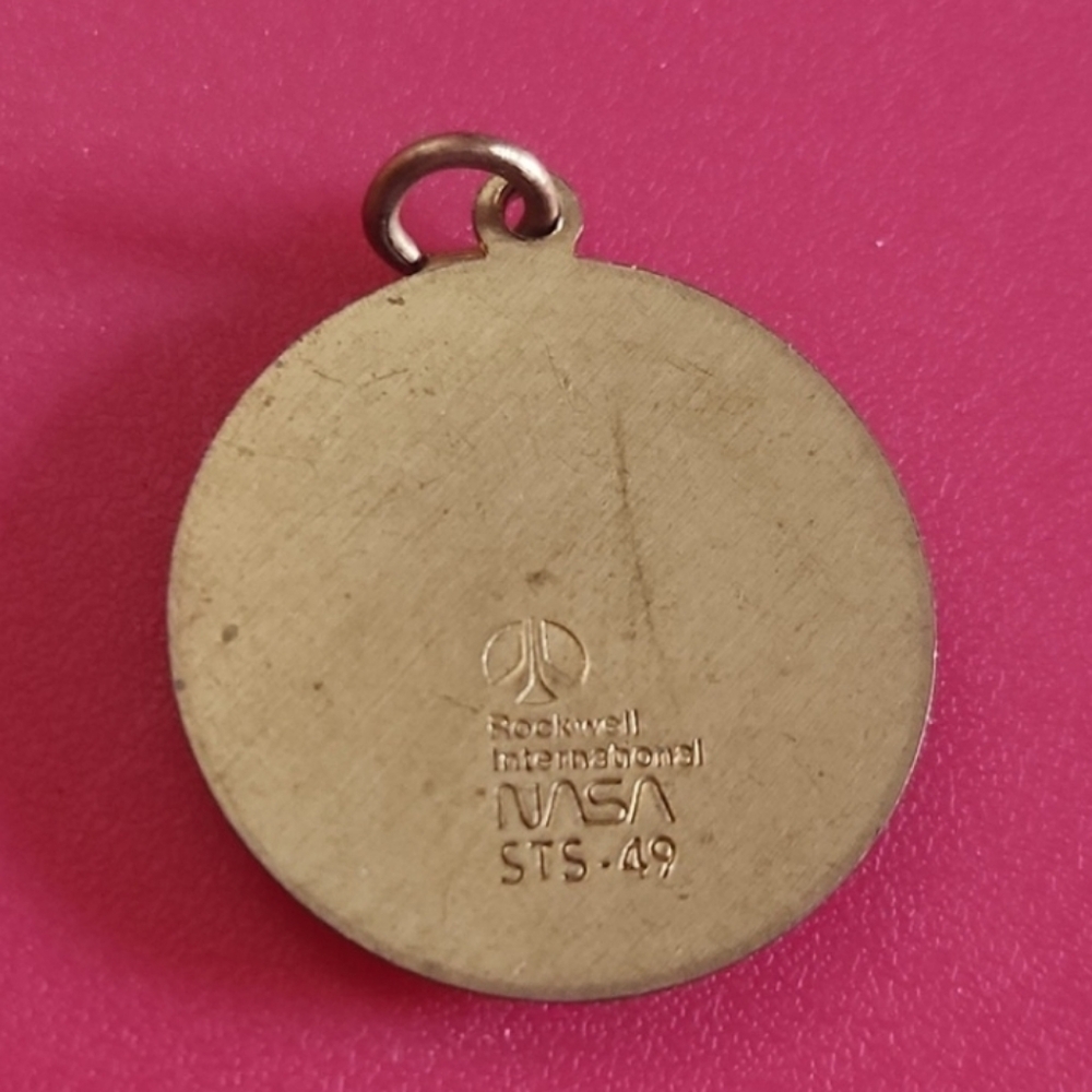 Rockwell International NASA Gold Pendant